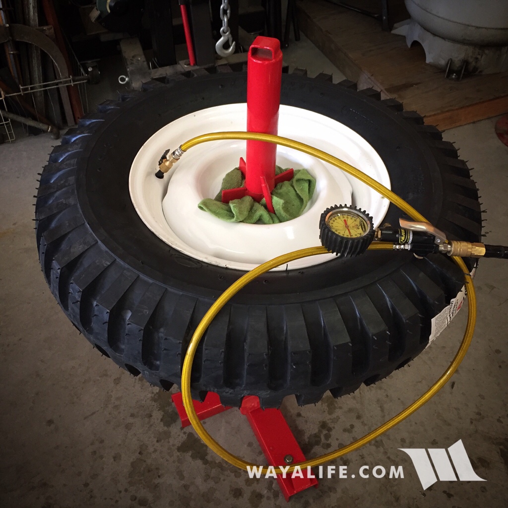 Installing a Firestone 7.00x16 NDT tire onto an Omix-Ada Willys replica steel wheel